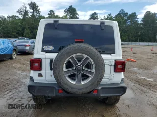 2019 Jeep Wrangler Unlimited Sahara with VIN 1C4HJXEG9KW547685, listed as a Copart auction lot 60901085 with 81,169 mi miles and Salvage title. Bid and sale history available at DreamBid. Image 6.