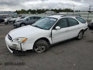 2002 Ford Taurus SE Standard with VIN 1FAFP58S42A163911, listed as a Copart auction lot 73544524 with 97,428 mi miles and Salvage title. Bid and sale history available at DreamBid. Image 1.
