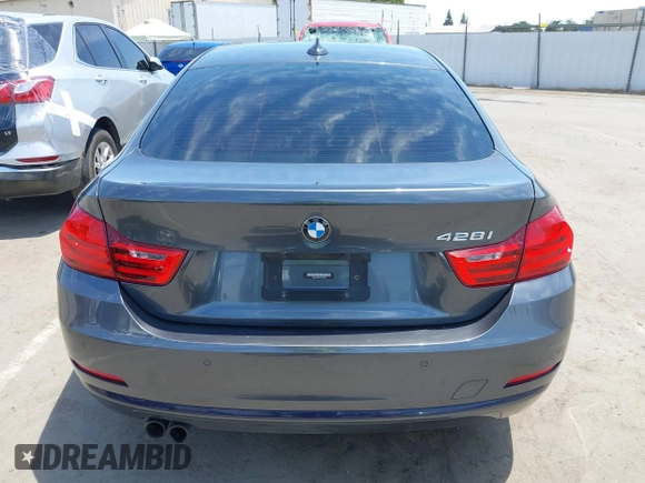 2015 BMW 4 Series 428i with VIN WBA4A5C59FG052596, listed as a IAAI auction lot 42649927 with 68,842 mi miles and . Bid and sale history available at DreamBid. Image 16.