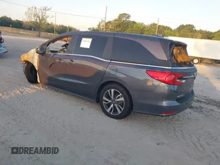 2023 Honda Odyssey Touring with VIN 5FNRL6H84PB053582, listed as a IAAI auction lot 42012108 with Not Provided miles and . Bid and sale history available at DreamBid. Image 3.