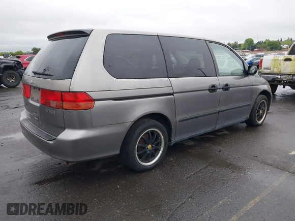 2000 Honda Odyssey LX z VIN 2HKRL1857YH570211, wystawiony jako IAAI lot #42139263 z przebiegiem 161 983 mil mil oraz . Historia ofert i sprzedaży dostępna na DreamBid. Obrazek 4.