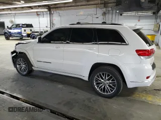 2018 Jeep Grand Cherokee Summit with VIN 1C4RJFJT5JC273869, listed as a Copart auction lot 57482865 with 70,843 mi miles and Salvage title. Bid and sale history available at DreamBid. Image 2.