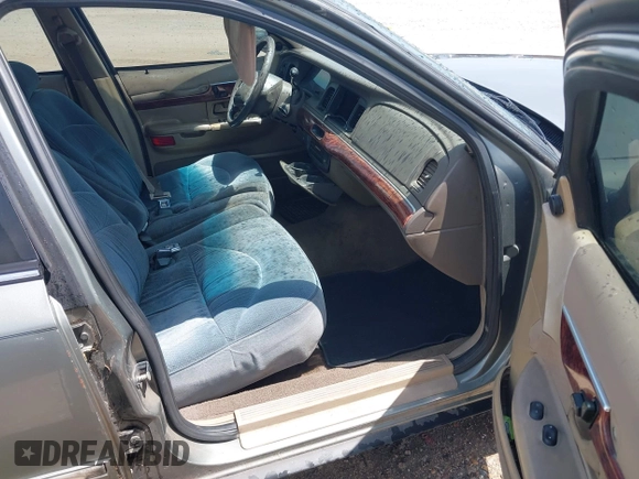 2002 Mercury Grand Marquis LS Premium z VIN 2MEFM75W22X617584, wystawiony jako IAAI lot #42444579 z przebiegiem 199 914 mil mil oraz . Historia ofert i sprzedaży dostępna na DreamBid. Obrazek 5.