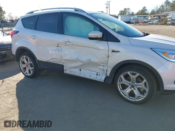 2019 Ford Escape Titanium with VIN 1FMCU9J91KUB21842, listed as a IAAI auction lot 41632210 with 104,900 mi miles. Bid and sale history available at carsss.com. Image 6.