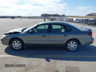 2003 Ford Taurus SES Standard with VIN 1FAFP55283G168564, listed as a IAAI auction lot 41884130 with 199,923 mi miles and . Bid and sale history available at DreamBid. Image 14.