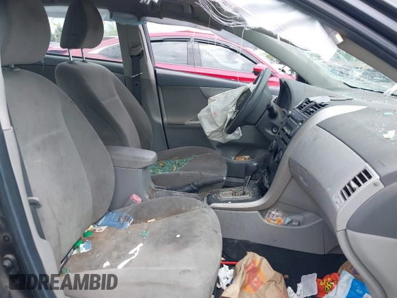 2010 Toyota Corolla z VIN 1NXBU4EE7AZ313190, wystawiony jako IAAI lot #42071393 z przebiegiem Nie podano mil oraz . Historia ofert i sprzedaży dostępna na DreamBid. Obrazek 5.