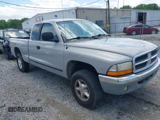 2000 Dodge Dakota SLT z VIN 1B7GG22X9YS744843, wystawiony jako IAAI lot #42371509 z przebiegiem 184 968 mil mil oraz . Historia ofert i sprzedaży dostępna na DreamBid. Obrazek 1.