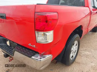 2012 Toyota Tundra z VIN 5TFUM5F11CX028307, wystawiony jako IAAI lot #41952532 z przebiegiem 253 254 mil mil oraz . Historia ofert i sprzedaży dostępna na DreamBid. Obrazek 19.