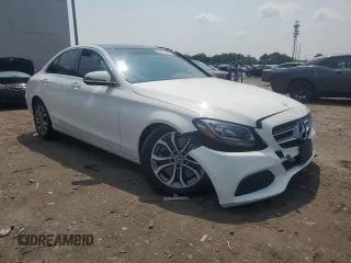 2017 Mercedes-Benz C 300 with VIN 55SWF4KB2HU220007, listed as a Copart auction lot 60615465 with 50,630 mi miles and Salvage title. Bid and sale history available at DreamBid. Image 4.