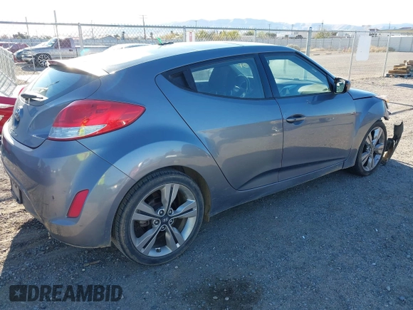 2017 Hyundai Veloster with VIN KMHTC6AD9HU323472, listed as a IAAI auction lot 41865974 with 94,692 mi miles. Bid and sale history available at carsss.com. Image 4.