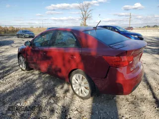 2012 Kia Forte SX with VIN KNAFW4A37C5559381, listed as a Copart auction lot 75927404 with 148,416 mi miles and Salvage Title. Bid and sale history available at carsss.com. Image 2.