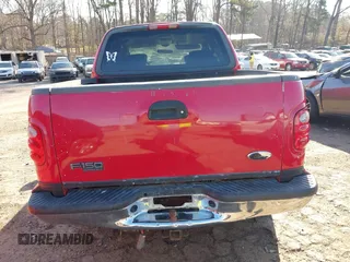 2003 Ford F-150 XLT with VIN 1FTRW07L03KC47484, listed as a IAAI auction lot 41653389 with 283,296 mi miles. Bid and sale history available at carsss.com. Image 16.