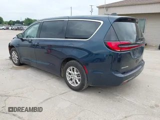 2023 Chrysler Pacifica Touring L z VIN 2C4RC1BG8PR526374, wystawiony jako IAAI lot #42525173 z przebiegiem 67 044 mil mil oraz . Historia ofert i sprzedaży dostępna na DreamBid. Obrazek 3.