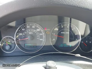 2007 Jeep Grand Cherokee Laredo with VIN 1J8GR48K67C523705, listed as a IAAI auction lot 41774281 with 215,572 mi miles. Bid and sale history available at carsss.com. Image 7.