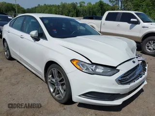 2018 Ford Fusion SE z VIN 3FA6P0H76JR164822, wystawiony jako IAAI lot #42156977 z przebiegiem 136 691 mil mil oraz . Historia ofert i sprzedaży dostępna na DreamBid. Obrazek 1.