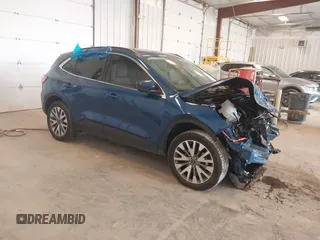 2022 Ford Escape Titanium Hybrid with VIN 1FMCU9DZ9NUA38627, listed as a IAAI auction lot 42288647 with 54,802 mi miles and . Bid and sale history available at DreamBid. Image 1.