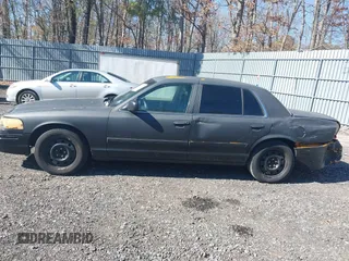 2011 Ford Crown Victoria with VIN 2FABP7AV9BX121739, listed as a IAAI auction lot 41763311 with 215,727 mi miles. Bid and sale history available at carsss.com. Image 14.