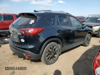 2016 Mazda CX-5 Grand Touring with VIN JM3KE4DY8G0719113, listed as a Copart auction lot 52160285 with 259,365 mi miles and Salvage Title. Bid and sale history available at carsss.com. Image 3.