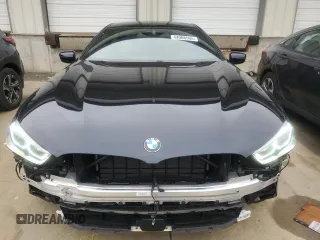 2022 BMW 8 Series M850i z VIN WBAGV8C03NCJ36975, wystawiony jako Copart lot #44008505 z przebiegiem 16 631 mil mil oraz Szkoda całkowita • Salvage title. Historia ofert i sprzedaży dostępna na DreamBid. Obrazek 5.