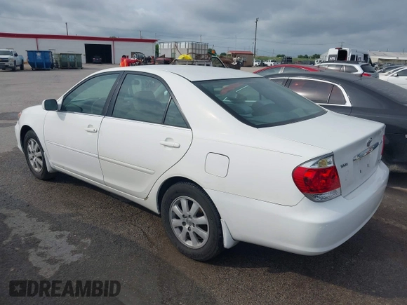 2005 Toyota Camry LE with VIN 4T1BF32K55U083752, listed as a IAAI auction lot 42145407 with 229,838 mi miles and . Bid and sale history available at DreamBid. Image 3.