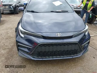 2023 Toyota Corolla SE with VIN 5YFS4MCE2PP143401, listed as a IAAI auction lot 42085852 with 50,959 mi miles and . Bid and sale history available at DreamBid. Image 12.