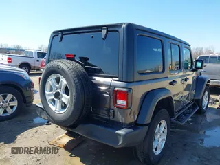 2022 Jeep Wrangler Unlimited Willys with VIN 1C4HJXDN1NW144112, listed as a IAAI auction lot 41867571 with 63,876 mi miles and . Bid and sale history available at DreamBid. Image 4.