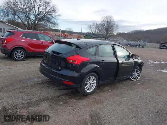 2015 Ford Focus SE with VIN 1FADP3K23FL373639, listed as a IAAI auction lot 41525834 with 62,170 mi miles. Bid and sale history available at carsss.com. Image 4.