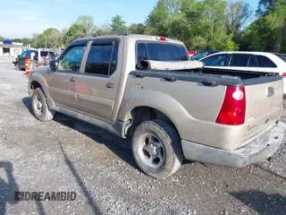2004 Ford Explorer Sport Trac XLS z VIN 1FMZU77K84UA47217, wystawiony jako IAAI lot #42169359 z przebiegiem 169 053 mil mil oraz . Historia ofert i sprzedaży dostępna na DreamBid. Obrazek 3.