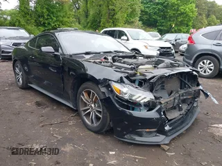 2016 Ford Mustang EcoBoost z VIN 1FA6P8TH8G5221774, wystawiony jako IAAI lot #42275505 z przebiegiem 111 115 mil mil oraz . Historia ofert i sprzedaży dostępna na DreamBid. Obrazek 6.
