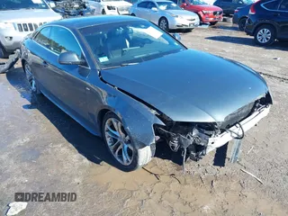 2009 Audi A5 with VIN WAUDK78T29A019706, listed as a IAAI auction lot 41697518 with 136,722 mi miles. Bid and sale history available at carsss.com. Image 1.