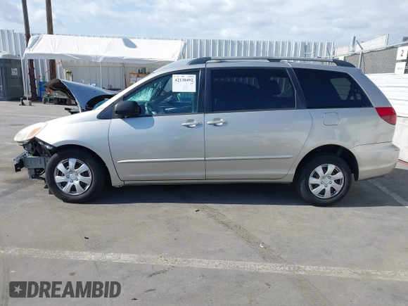2005 Toyota Sienna CE with VIN 5TDZA23C95S261007, listed as a IAAI auction lot 42130492 with 215,717 mi miles and . Bid and sale history available at DreamBid. Image 14.