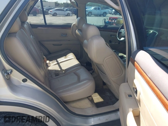 2008 Cadillac SRX AWD with VIN 1GYEE637280101842, listed as a IAAI auction lot 41417596 with 125,052 mi miles. Bid and sale history available at carsss.com. Image 8.