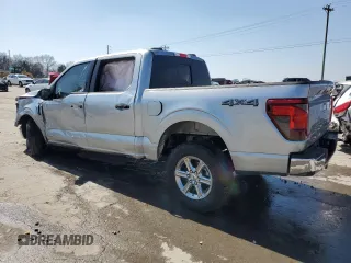 2024 Ford F-150 XLT with VIN 1FTFW3LD4RFB87701, listed as a Copart auction lot 48955865 with 1,203 mi miles and Salvage Title. Bid and sale history available at carsss.com. Image 2.