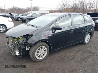 2015 Toyota Prius Two with VIN JTDZN3EU0FJ031208, listed as a IAAI auction lot 41910346 with 72,973 mi miles and . Bid and sale history available at DreamBid. Image 2.