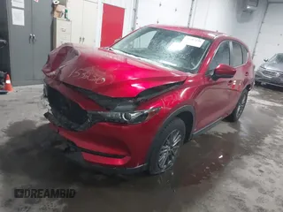 2017 Mazda CX-5 Sport with VIN JM3KFBBL4H0152814, listed as a IAAI auction lot 41487258 with 158,161 mi miles and . Bid and sale history available at DreamBid. Image 2.