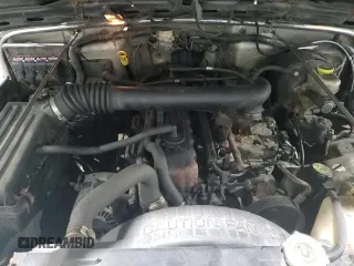 2005 Jeep Wrangler SE z VIN 1J4FA29S25P360452, wystawiony jako Copart lot #86361184 z przebiegiem 137 829 mil mil oraz Szkoda całkowita • Salvage title. Historia ofert i sprzedaży dostępna na DreamBid. Obrazek 14.