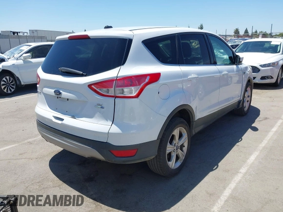 2014 Ford Escape SE with VIN 1FMCU9G98EUA39702, listed as a IAAI auction lot 42683914 with 276,162 mi miles and . Bid and sale history available at DreamBid. Image 4.