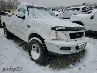 1998 Ford F-150 Standard with VIN 1FTRF18L9WNB61551, listed as a Copart auction lot 82864544 with 0 mi miles and Salvage Title. Bid and sale history available at carsss.com. Image 11.