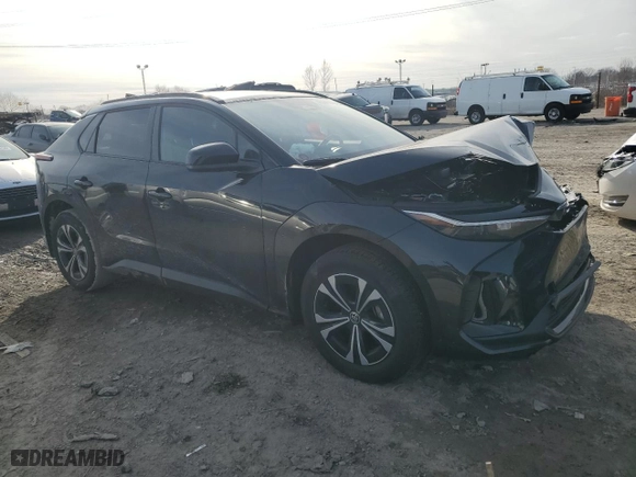 2024 Toyota bZ4X XLE with VIN JTMAAAAA0RA032257, listed as a Copart auction lot 43852735 with 6,961 mi miles and Salvage Title. Bid and sale history available at carsss.com. Image 4.