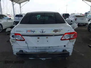 2011 Toyota Corolla L with VIN JTDBU4EE9B9131113, listed as a IAAI auction lot 42028423 with 191,157 mi miles. Bid and sale history available at carsss.com. Image 17.