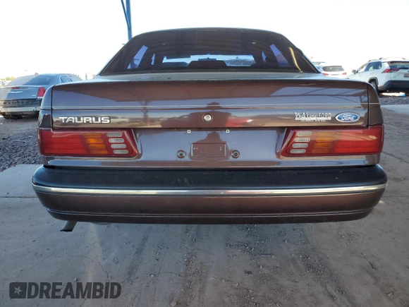 1988 Ford Taurus LX with VIN 1FABP5345JG210480, listed as a Copart auction lot 50248585 with 47,172 mi miles and Salvage Title. Bid and sale history available at carsss.com. Image 6.