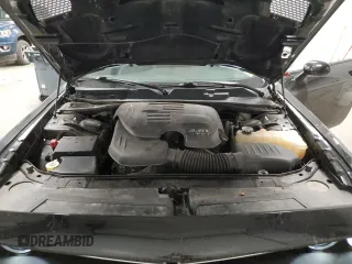 2015 Dodge Challenger SXT Plus z VIN 2C3CDZBG1FH913861, wystawiony jako Copart lot #52806785 z przebiegiem 61 254 mil mil oraz Szkoda całkowita • Salvage title. Historia ofert i sprzedaży dostępna na DreamBid. Obrazek 11.