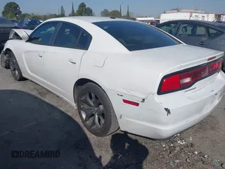 2013 Dodge Charger SE with VIN 2C3CDXBG2DH597792, listed as a IAAI auction lot 41630715 with 53,033 mi miles. Bid and sale history available at carsss.com. Image 3.