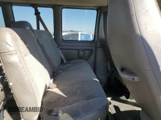 2012 Chevrolet Express Passenger 1LT z VIN 1GAZG1FG4C1100252, wystawiony jako Copart lot #73242444 z przebiegiem 76 779 mil mil oraz Szkoda całkowita • Salvage title. Historia ofert i sprzedaży dostępna na DreamBid. Obrazek 11.