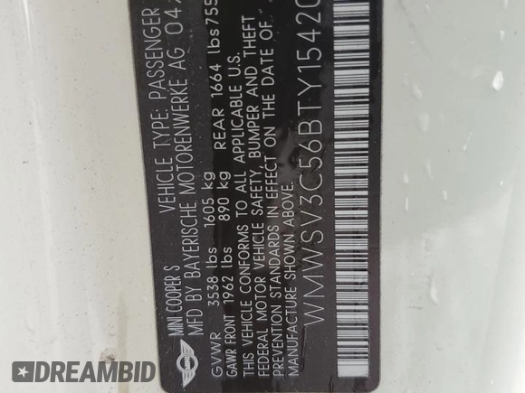 2011 MINI Hardtop S with VIN WMWSV3C56BTY15420, listed as a Copart auction lot 58050875 with 162,145 mi miles and Salvage title. Bid and sale history available at DreamBid. Image 12.