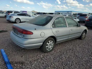 1998 Mercury Mystique GS с VIN 1MEFM6530WK662855, выставлен на аукционе Copart как лот 62407575 с пробегом 135 987 миль миль и Чистый • Clean title. История ставок и продаж доступна на DreamBid. Изображение 3.