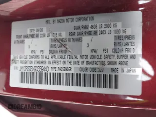 2009 Mazda Mazda5 Sport with VIN JM1CR293X90339440, listed as a IAAI auction lot 41525453 with 173,640 mi miles. Bid and sale history available at carsss.com. Image 9.