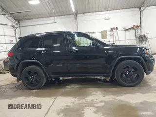 2021 Jeep Grand Cherokee Laredo X with VIN 1C4RJFAG5MC817567, listed as a IAAI auction lot 42297526 with 71,387 mi miles and . Bid and sale history available at DreamBid. Image 13.
