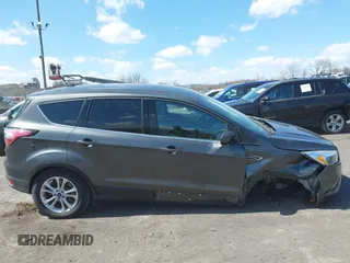 2017 Ford Escape SE with VIN 1FMCU9GD5HUC17297, listed as a IAAI auction lot 41880013 with 57,737 mi miles and . Bid and sale history available at DreamBid. Image 13.