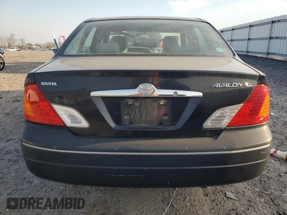 2001 Toyota Avalon XL z VIN 4T1BF28B61U175674, wystawiony jako Copart lot #49913765 z przebiegiem 170 245 mil mil oraz Tytuł czysty. Historia ofert i sprzedaży dostępna na DreamBid. Obrazek 6.